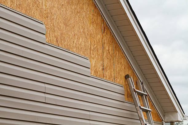 Professional Emergency Siding Repair technician working in Oxford, OH